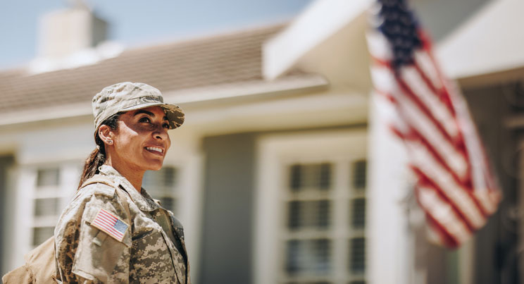 female soldier returning home