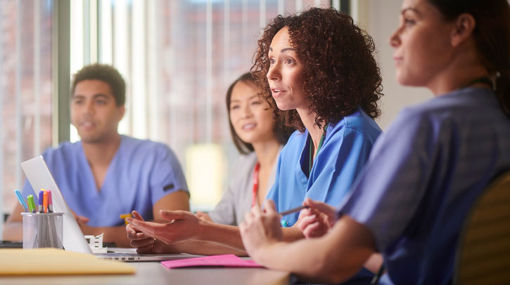 group of medical professionals collaborating