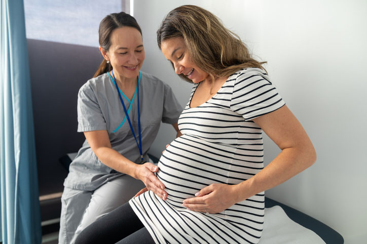 cnm checking on mother-to-be and baby