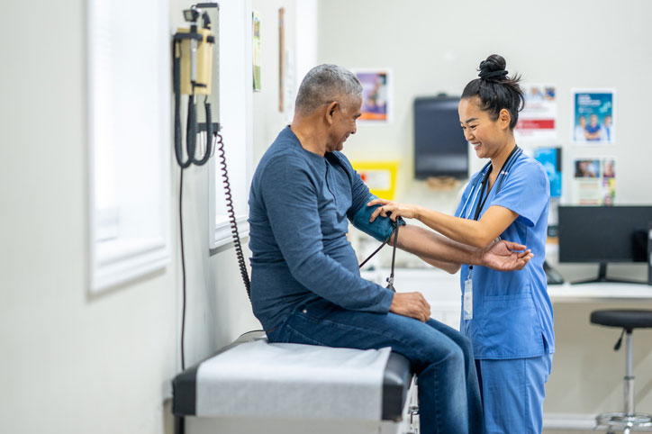 checking blood pressure